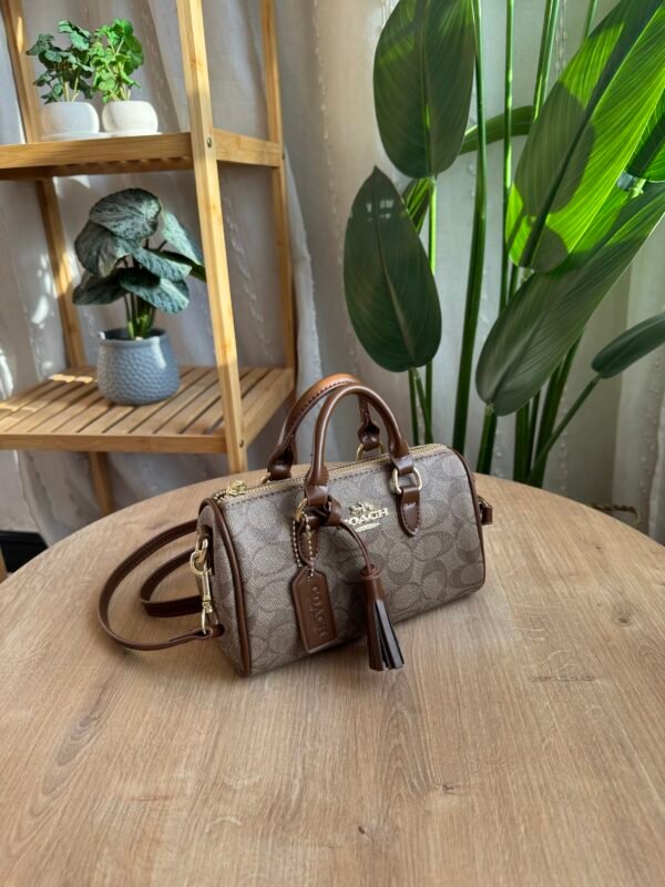 حقيبة coach لون جوزي