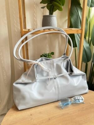 حقيبة لون سمائي