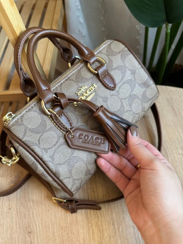 حقيبة coach لون جوزي