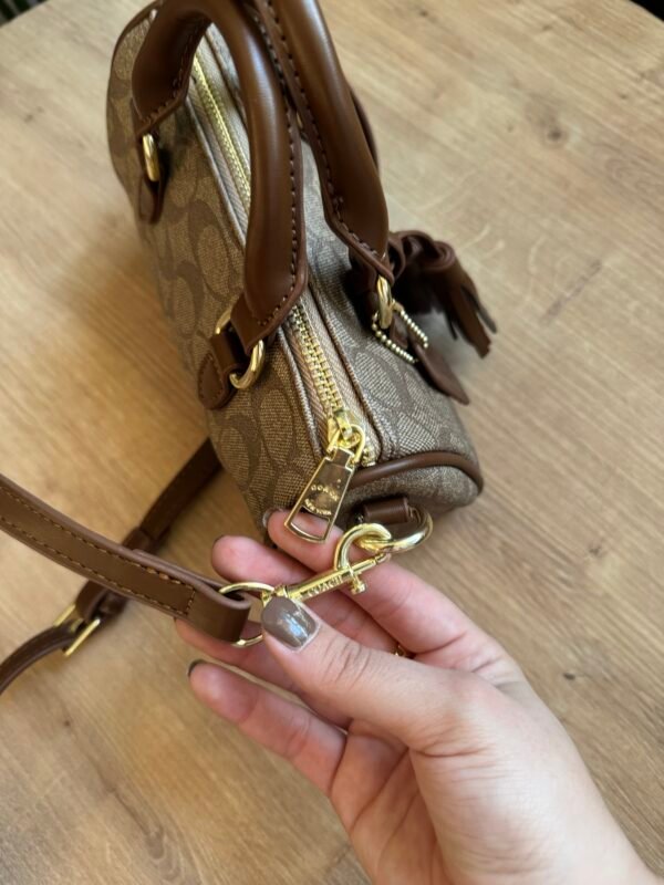 حقيبة coach لون جوزي