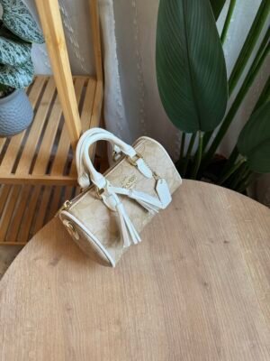 img_0735 حقيبة coach لون بيجي مطعم ابيض