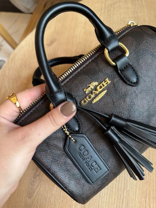 حقيبة coach لون بني غامق