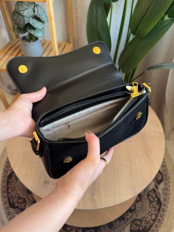 حقيبة مخمل لون اسود فاحم