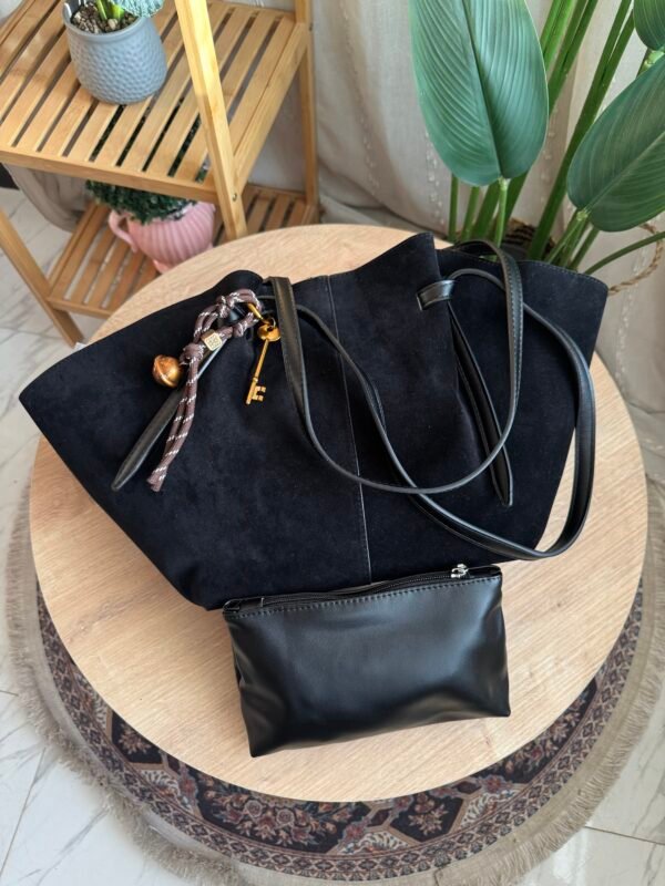 حقيبة مخمل لون اسود