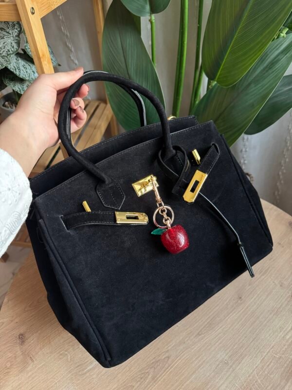 حقيبة مخمل لون اسود