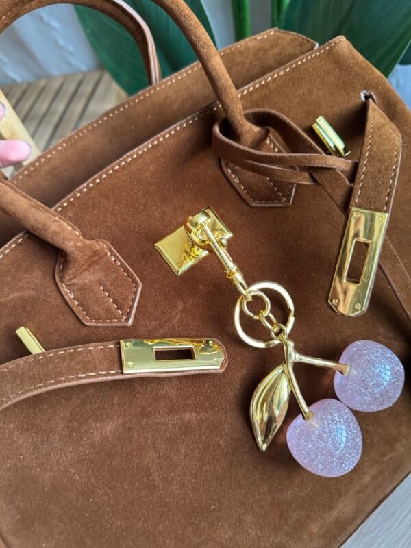 حقيبة مخمل لون عسلي