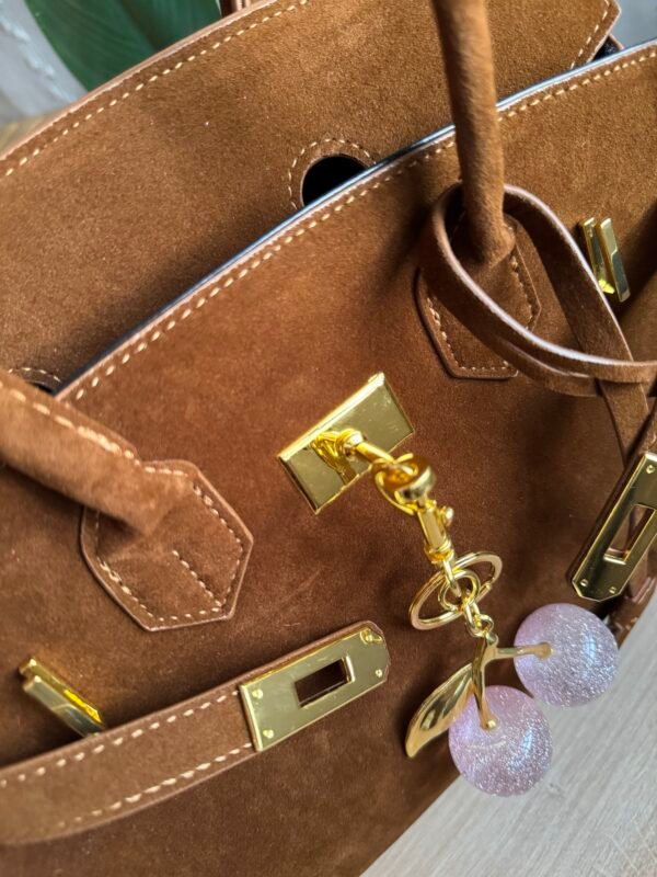 حقيبة مخمل لون عسلي