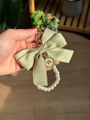 img_7853 مداليه الفيونكة لون فستقي