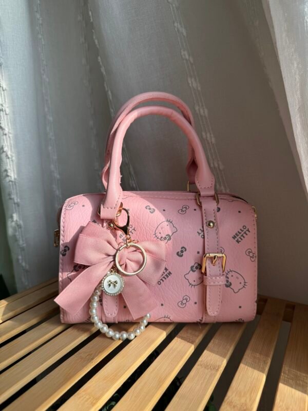 img_8278 حقيبة هيلوكتي لون وردي (بدون مداليه)