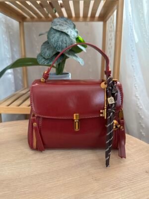 حقيبة فخمة لون ماروني