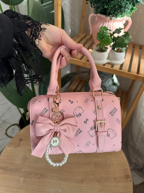 img_8364 حقيبة هيلوكتي لون وردي (بدون مداليه)