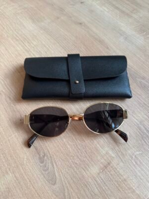 نظارة اطار ذهبي مع نقشه نمري في الحواف