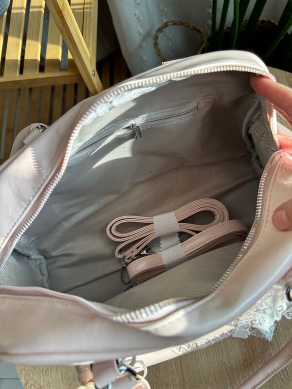 img_9985 حقيبة واسعة لون وردي فاتج (مع المداليات)