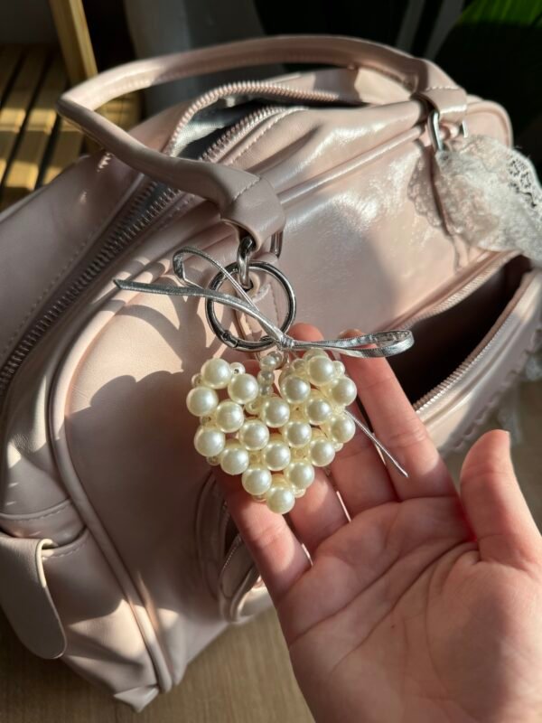 img_9991 حقيبة واسعة لون وردي فاتج (مع المداليات)