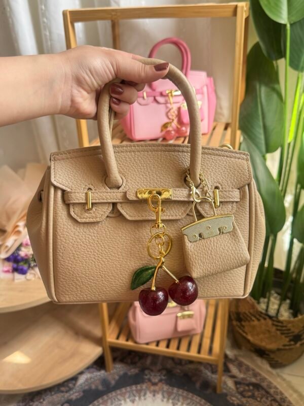 حقيبة هرمز لون بيجي